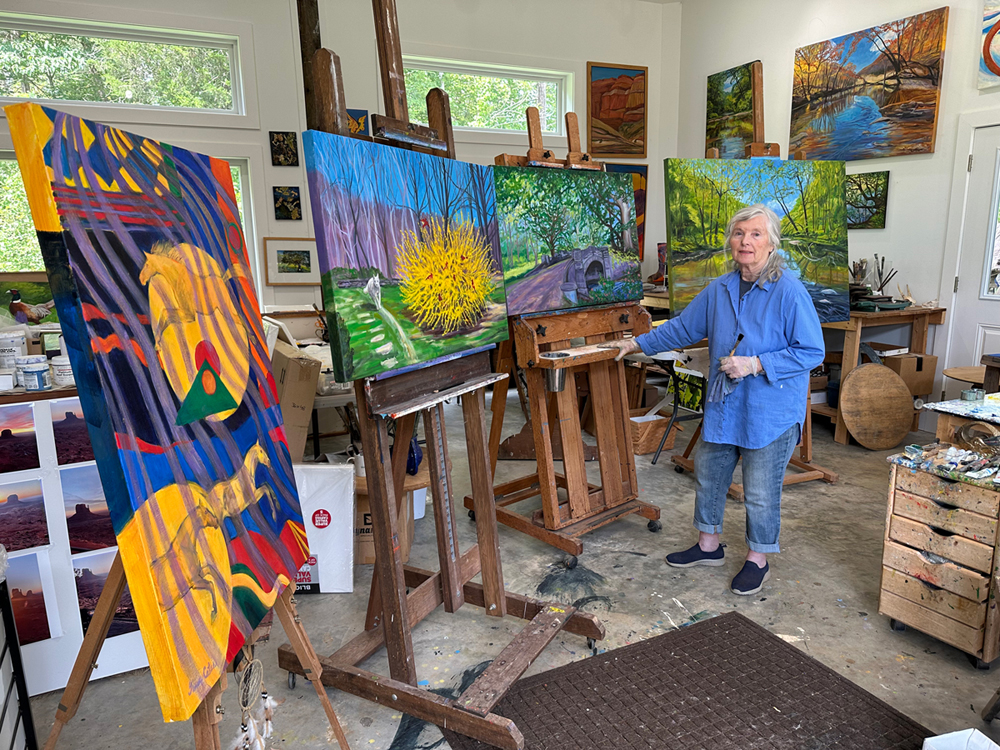 Gwen In her Studio with Paintings